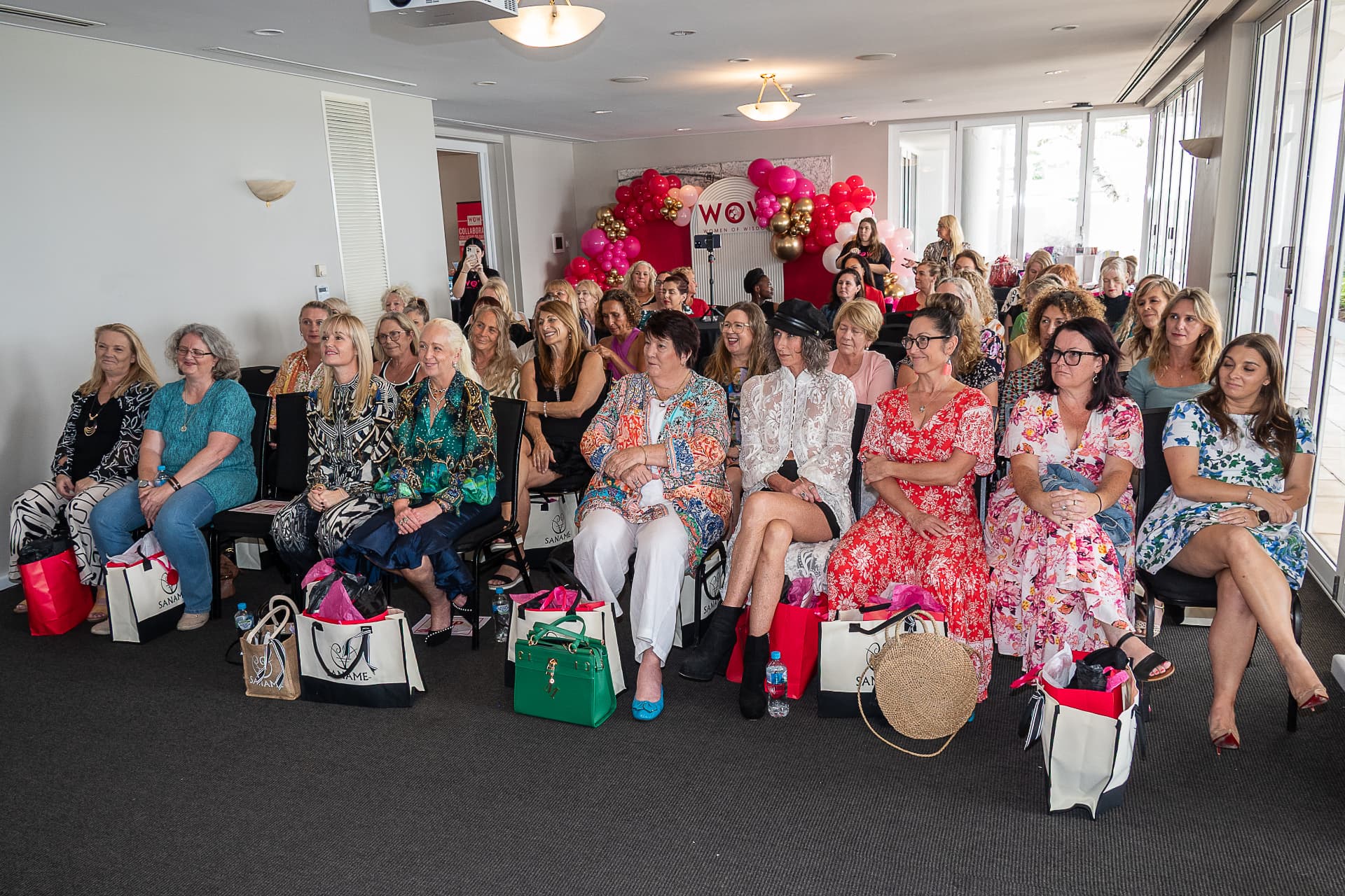A full room of women seated at the WOW breakfast